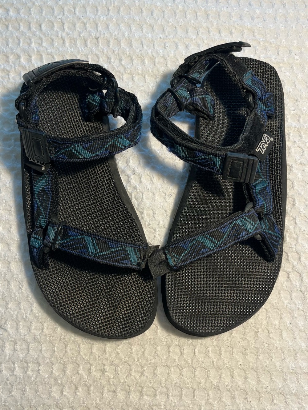 Teva Women's Black Sandals with Blue-Green Patterned Straps